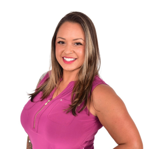 A woman with long straight hair, wearing a sleeveless pink top, smiles at the camera against a plain white background.